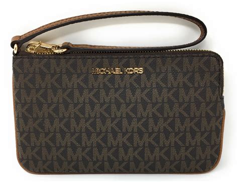 michael kors jet set charm large top zip wristlet|mk double zip wallet.